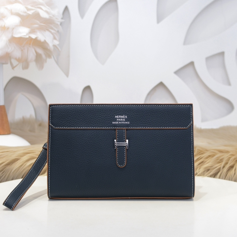H**mes clutch bags